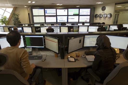 technicians-monitor-data-flow-in-the-control-room-of-an-internet-servi.jpg